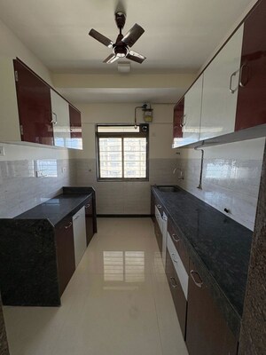 Kitchen in 2 BHK Apartment at Acme Ozone, Manpada – for Rent