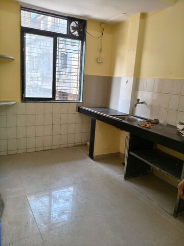 Kitchen in 1 BHK Apartment at Sai Kutir CHS Nerul, Nerul Sector 21 – for Rent