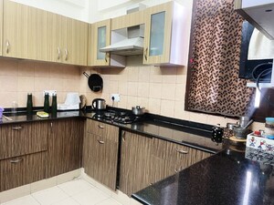 Kitchen in 3 BHK Apartment at PC Treasure Valley, East Canal Road – for Rent