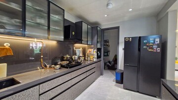 Kitchen in 4 BHK Apartment at Mansarovar Residency, Desai Village – for Sale