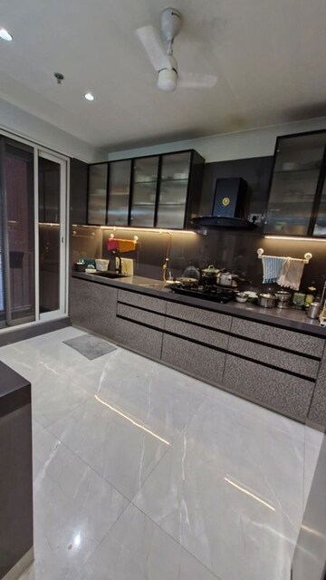 Kitchen in 4 BHK Apartment at Mansarovar Residency, Desai Village – for Sale