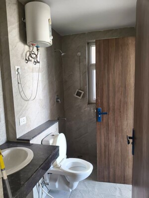 Bathroom in 3 BHK Apartment at Adani Oyster Grande Phase 2, Sector 102 – for Rent