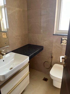 Bathroom in 3 BHK Apartment at Smart World Orchard, Sector 61 – for Rent