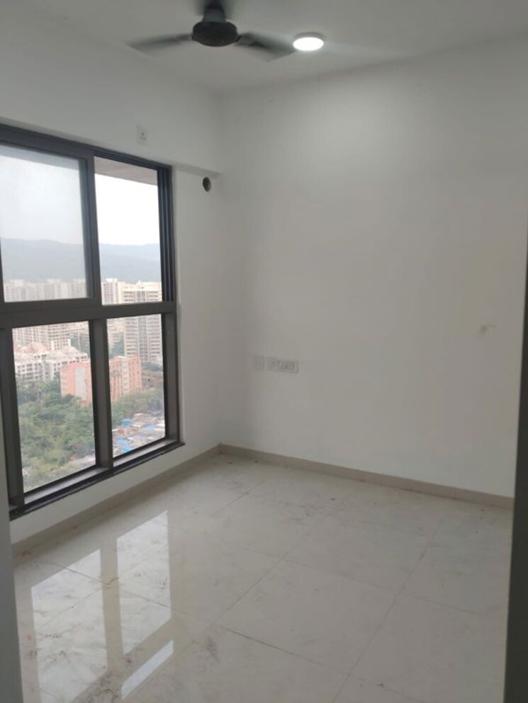 Living Room, uk-iridium 2 Bedroom 544 Sq.Ft. Apartment In Kandivali East Mumbai 9793848