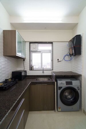 Kitchen in 2 BHK Apartment at Chandiwala Pearl Regency, Andheri West – for Rent