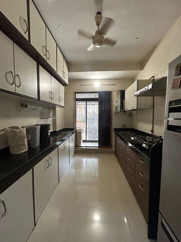 Kitchen in 2 BHK Apartment at Juhu Natraj CHS, Vile Parle West – for Sale