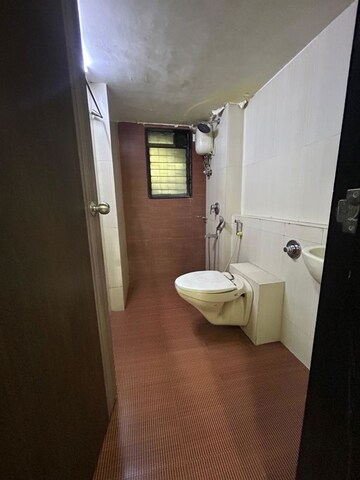 Bathroom in 2 BHK Apartment at Juhu Natraj CHS, Vile Parle West – for Sale