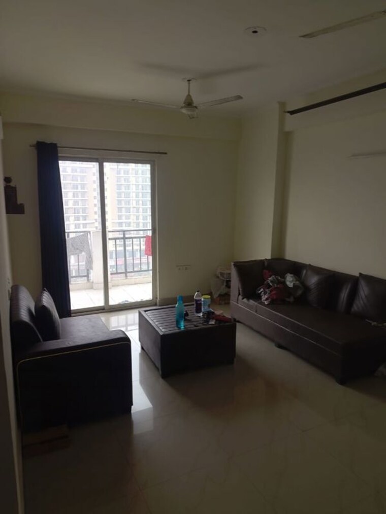 Living Room, aims-golf-city 2 Bedroom 950 Sq.Ft. Apartment In Sector 75 Noida 9794010