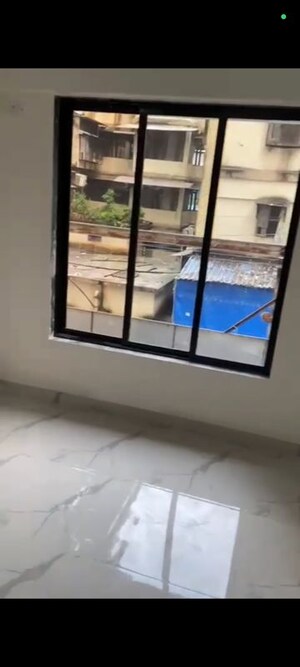 Living Room in 1 BHK Apartment at Mahanagar 11 Star, Agripada – for Sale