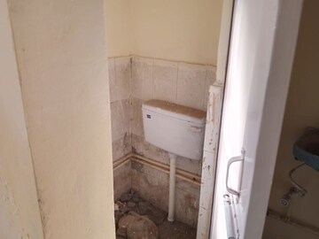 Bathroom in 1.5 BHK Apartment at Jahangir Puri – for Sale