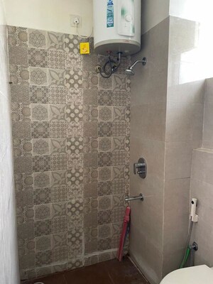 Bathroom in 1 BHK Apartment at Alliance The Eminence, Singhpura – for Rent