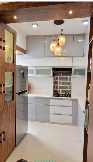 Kitchen in 3 BHK Apartment at Gaur Sportswood, Sector 79 – for Rent