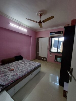 Bedroom in 2 BHK Apartment at Golden Park CHS, Kulgaon – for Rent