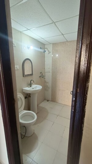 Bathroom in 2 BHK Apartment at Antriksh Golf View, Sector 78 – for Rent