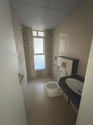 Bathroom in 1 BHK Apartment at Kolte Patil Xenia, Kharadi – for Rent