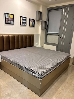 Bedroom in 2 BHK Apartment at DLF Cyber SEZ, Sector 24 – for Rent