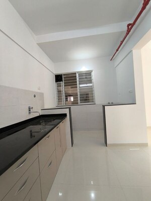 Kitchen in 2 BHK Apartment at Kolte Patil Western Avenue, Wakad – for Rent