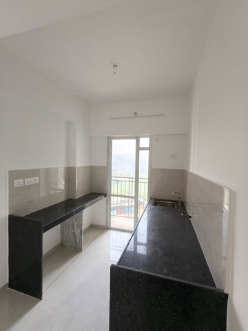 Kitchen in 1 BHK Apartment at Godrej Vihaa, Badlapur East – for Rent