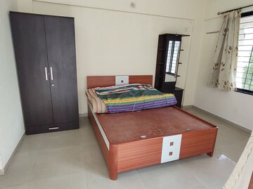 Bedroom in 2 BHK Apartment at Nisarg Akash, Pimple Nilakh – for Rent