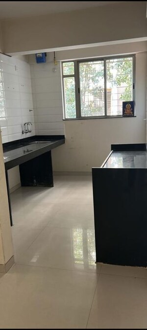 Kitchen in 2 BHK Apartment at Lanke Palm Avenue, Wakad – for Rent