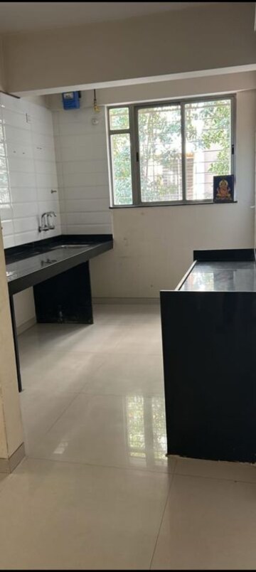 Kitchen in 2 BHK Apartment at Lanke Palm Avenue, Wakad – for Rent