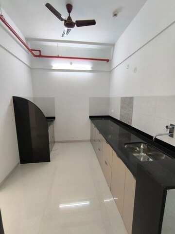 Kitchen in 3 BHK Apartment at Sonigara Kesar, Wakad – for Rent