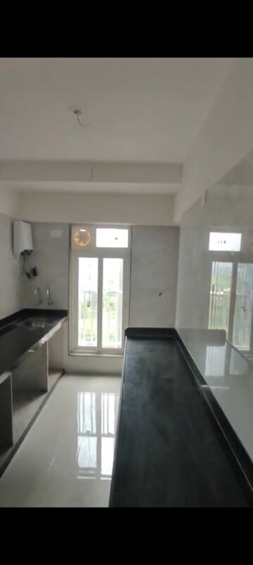 Living Room in 2 BHK Apartment at Zee Ashtavinayak, Andheri West – for Rent