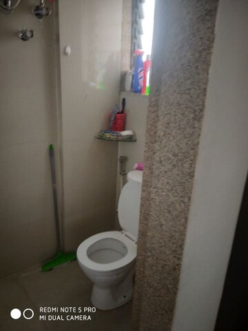 Bathroom in 1.5 BHK Apartment at Everest Country Side, Kasarvadavali – for Rent