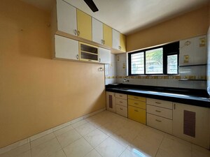 Kitchen in 2 BHK Apartment at Vadgaon Budruk – for Rent