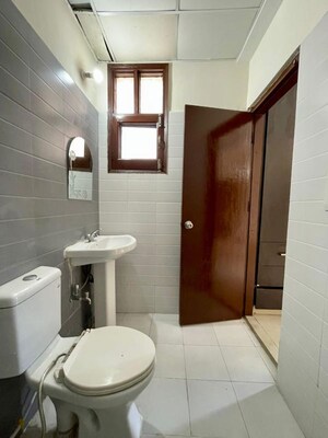 Bathroom in 3 BHK Builder Floor at Dhakoli – for Rent