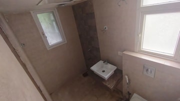 Bathroom in 2 BHK Apartment at Rishita Manhattan, Gomti Nagar – for Sale