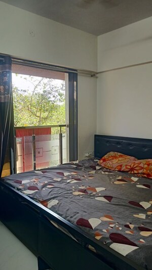 Bedroom in 1 BHK Apartment at Vimal Nagar CHS, Kandivali West – for Rent
