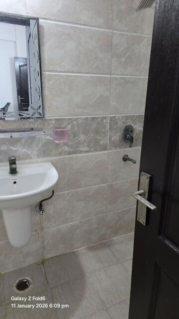 Bathroom in 2.5 BHK Apartment at Amrapali Princely Estate, Sector 76 – for Rent