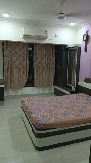 Bedroom in 2 BHK Apartment at Harshail Flamingo Apartments, Malad West – for Rent