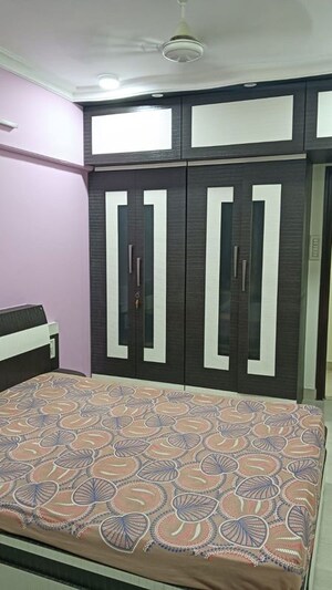 Bedroom in 2 BHK Apartment at Harshail Flamingo Apartments, Malad West – for Rent