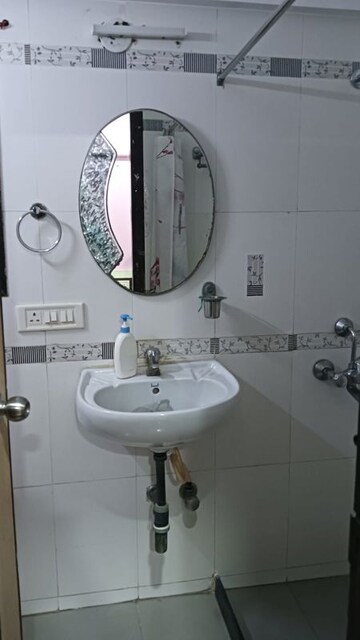 Bathroom in 2 BHK Apartment at Harshail Flamingo Apartments, Malad West – for Rent