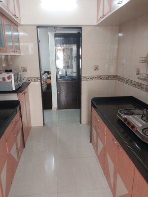Kitchen in 2 BHK Apartment at Harshail Flamingo Apartments, Malad West – for Rent