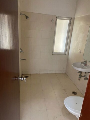 Bathroom in 5 BHK Apartment at Omaxe Putting Greens, Omega Ii Greater Noida – for Rent