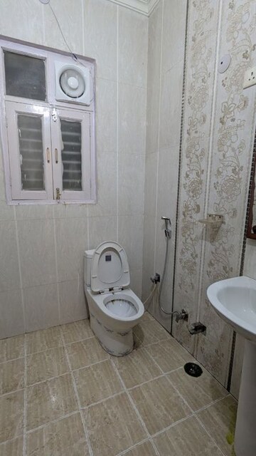 Bathroom in 4 BHK Builder Floor at Sector 21d – for Rent