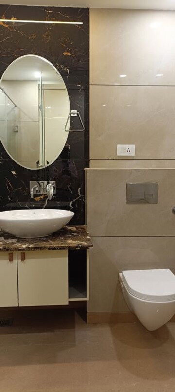 Bathroom in 4 BHK Builder Floor at Surajmal Vihar – for Sale