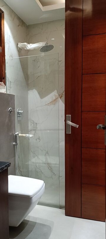 Bathroom in 4 BHK Builder Floor at Surajmal Vihar – for Sale