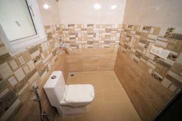 Bathroom in 3 BHK Apartment at Presithum, Sector 25 Yamuna Expressway – for Rent