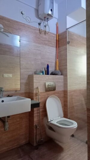 Bathroom in 3 BHK Apartment at Merlin Crest, Diamond Harbour – for Rent