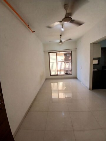 Room in 2 BHK Apartment at Malad East – for Rent