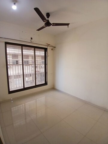 Room in 2 BHK Apartment at Malad East – for Rent