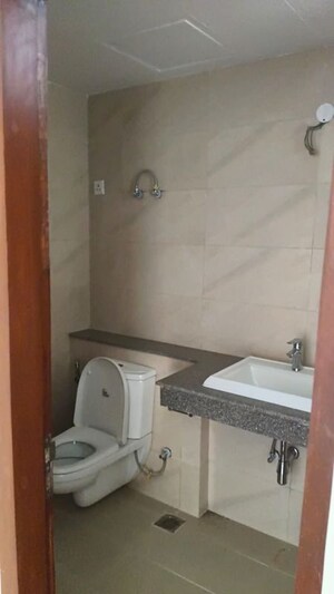 Bathroom in 3 BHK Apartment at Puri Aanandvilas, Sector 81 – for Sale