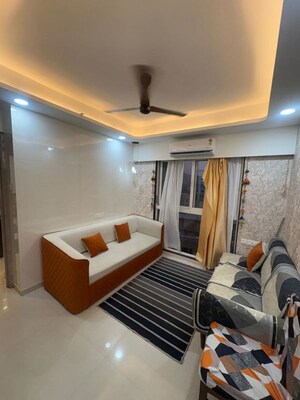 Living Room in 1 BHK Apartment at MICL Monteverde, Mira Road – for Rent