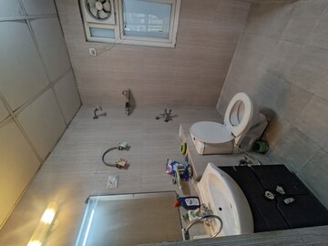 Bathroom in 3 BHK Apartment at Krishna Apra Royal Court, Sector 16 Greater Noida – for Rent