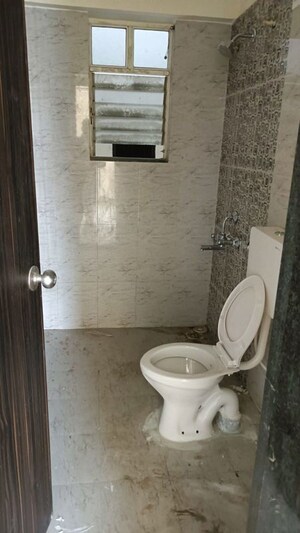 Bathroom in 2 BHK Apartment at Vedant Kingston Aura, Handewadi – for Rent