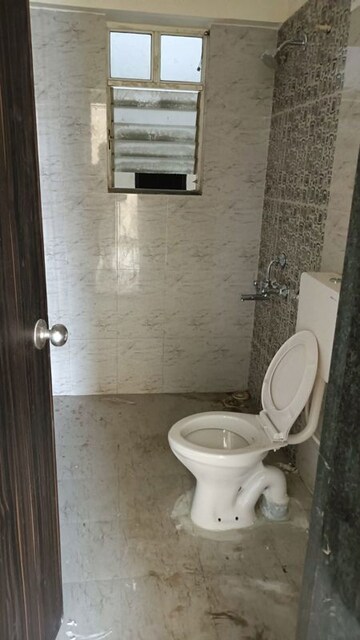 Bathroom in 2 BHK Apartment at Vedant Kingston Aura, Handewadi – for Rent